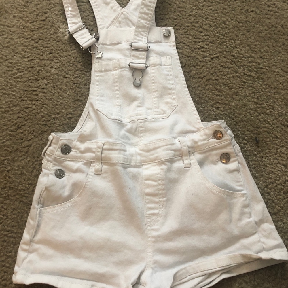 White Kylie and Kendall over alls